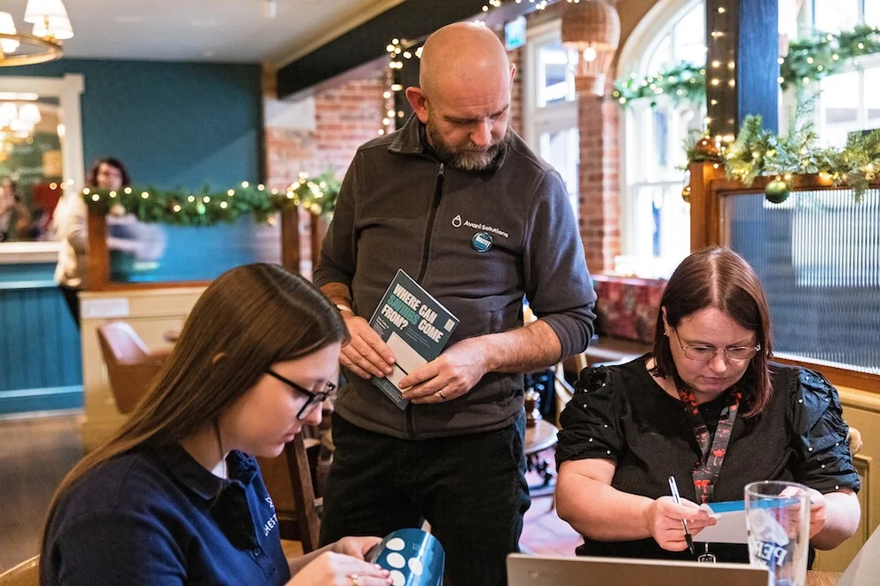 Avani Solutions training session in a pub